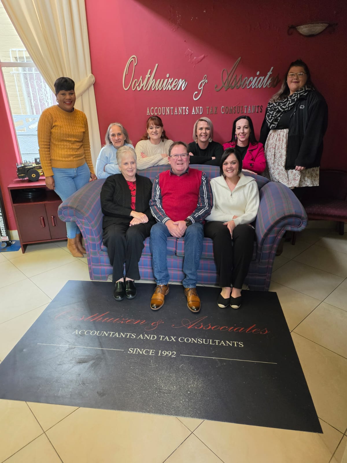 The Oosthuizen & Associates team in their office